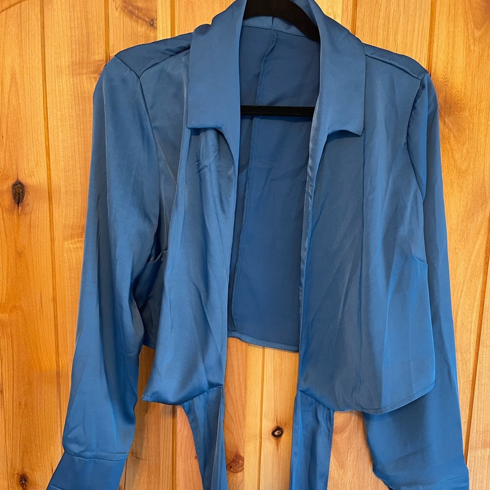 NWOT never worn blouse. Runs TTS.